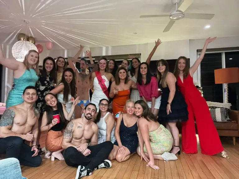 Yuri & Helder posing with ladies at hens party