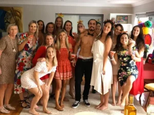 Yuri posing with ladies at hens party
